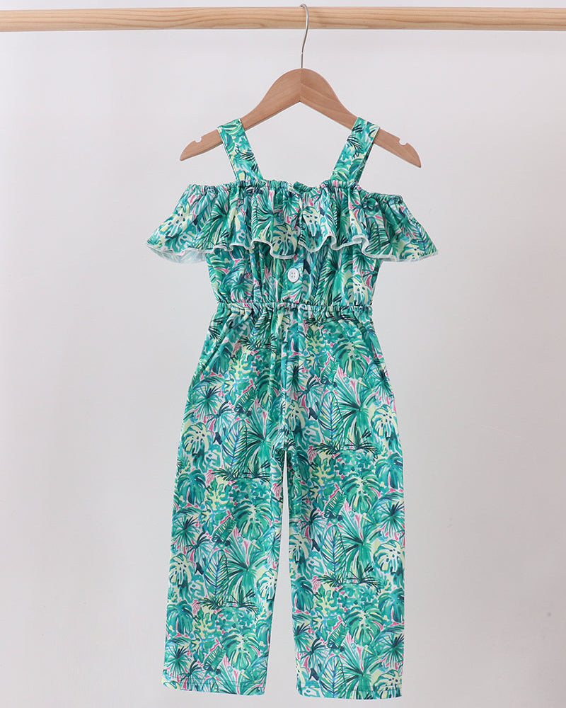 Green Lily floral jumpsuit with off-shoulder ruffle straps and wide-leg teal tropical print
