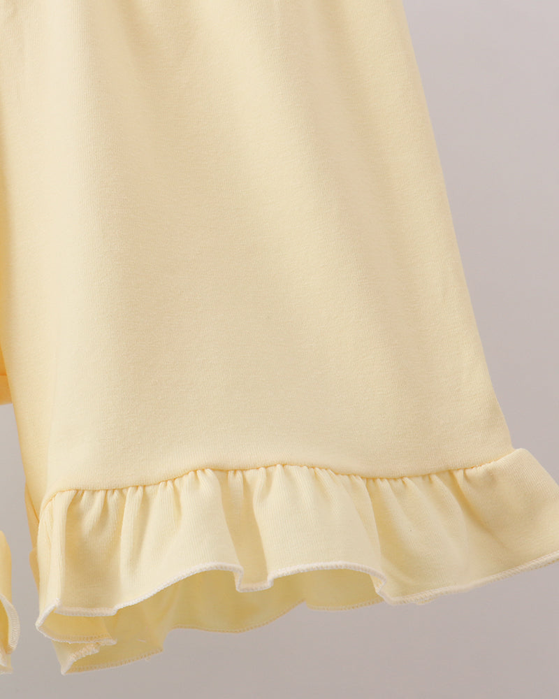 Light yellow ruffled shorts hem with elastic waistband