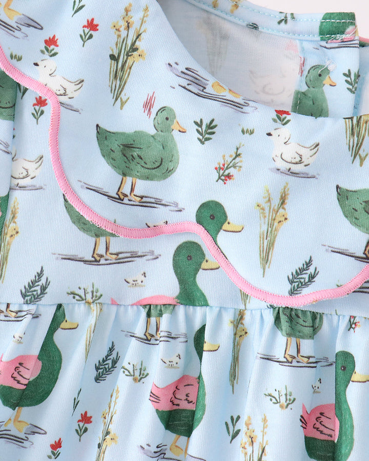 Light blue duck-print dress top with pink ruffled edge and elastic neckline