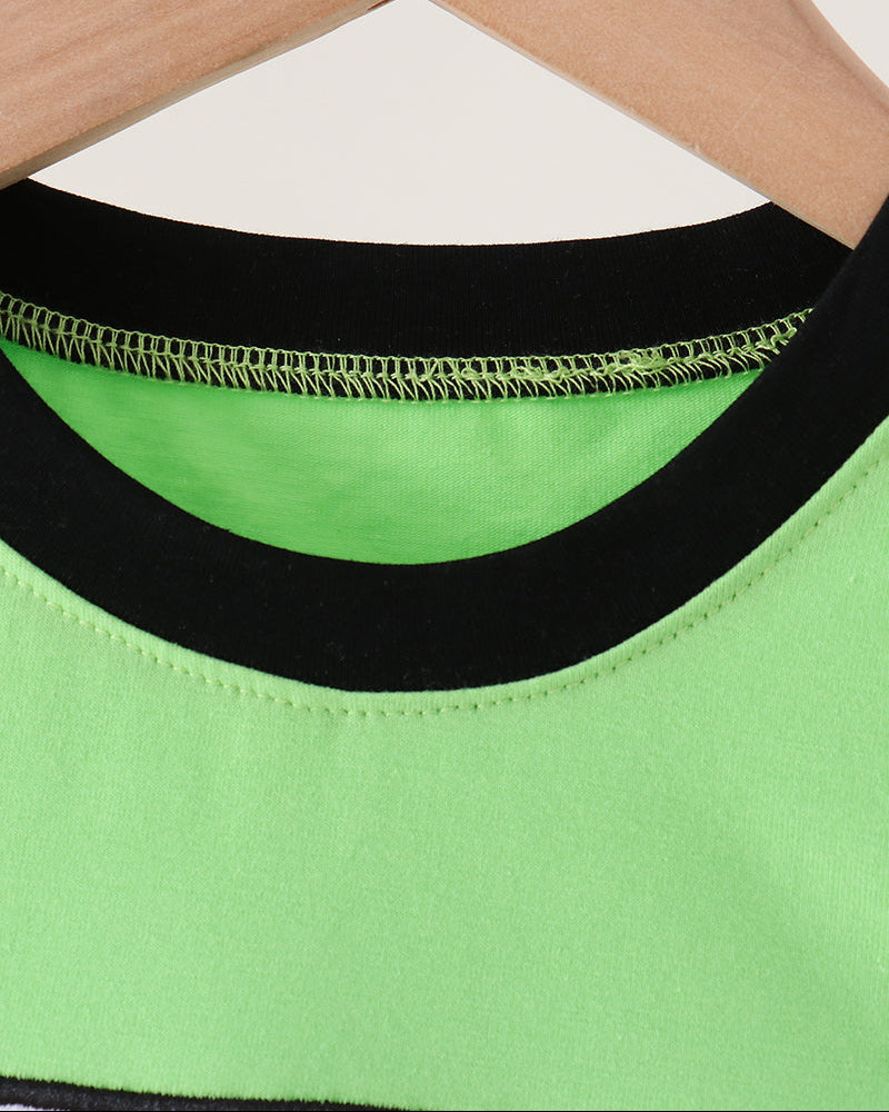 Light green neckline with black trim and green stitched edge detail