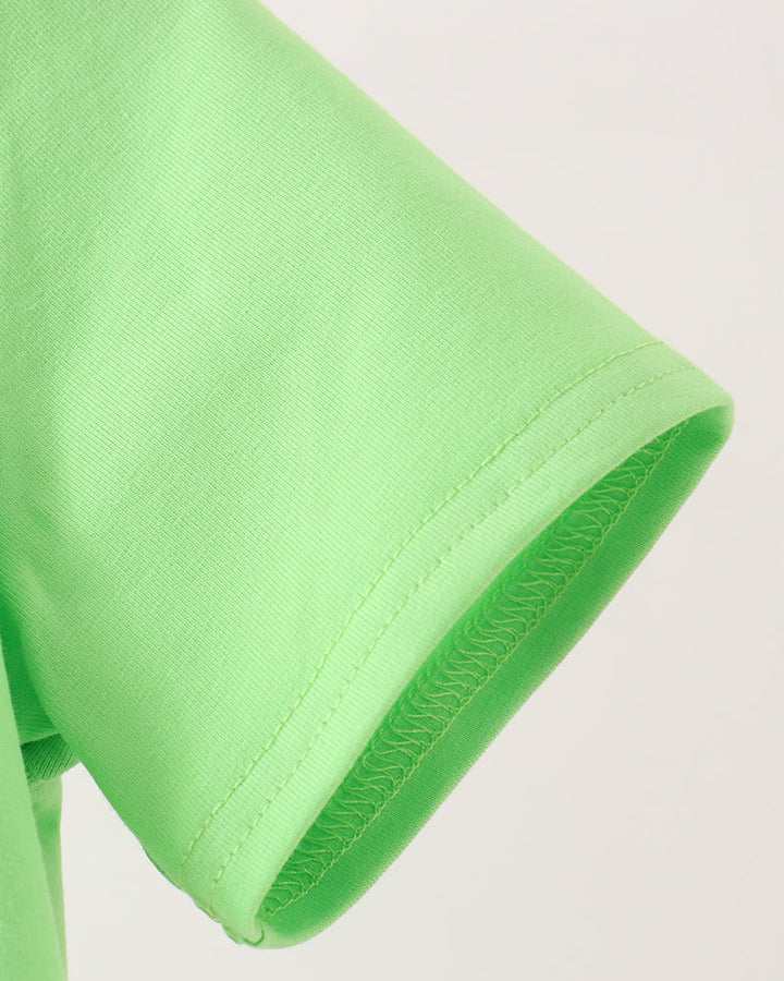 Light green short sleeve cuff with double-stitched hem detail