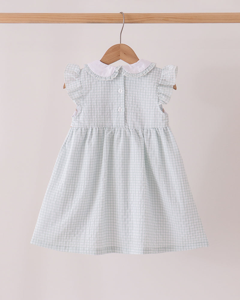 Light blue plaid ruffle dress with flutter sleeves and embroidered turkey