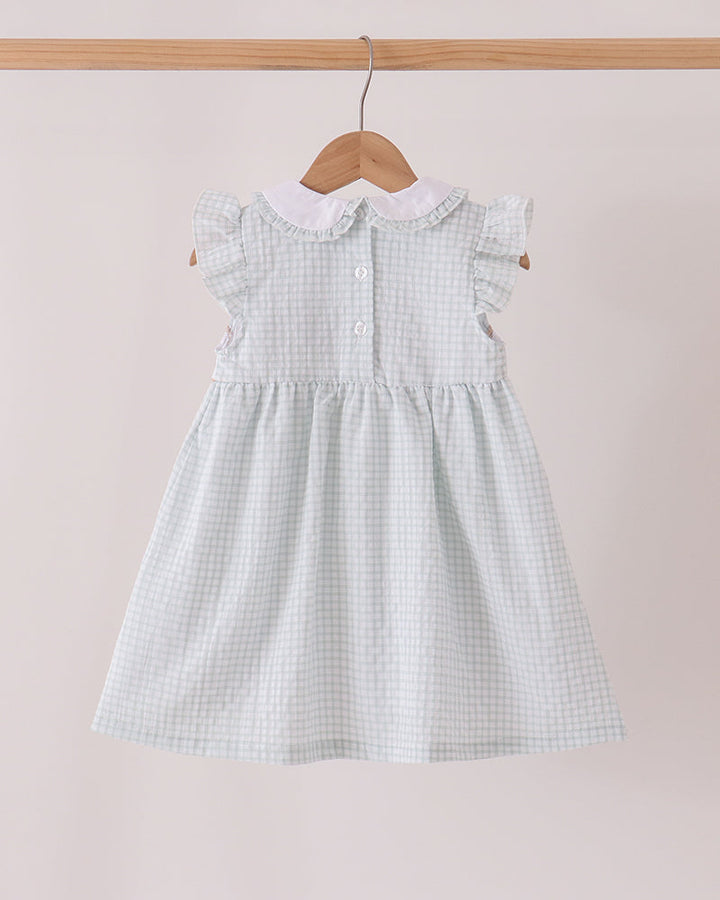 Light blue plaid ruffle dress with flutter sleeves and embroidered turkey