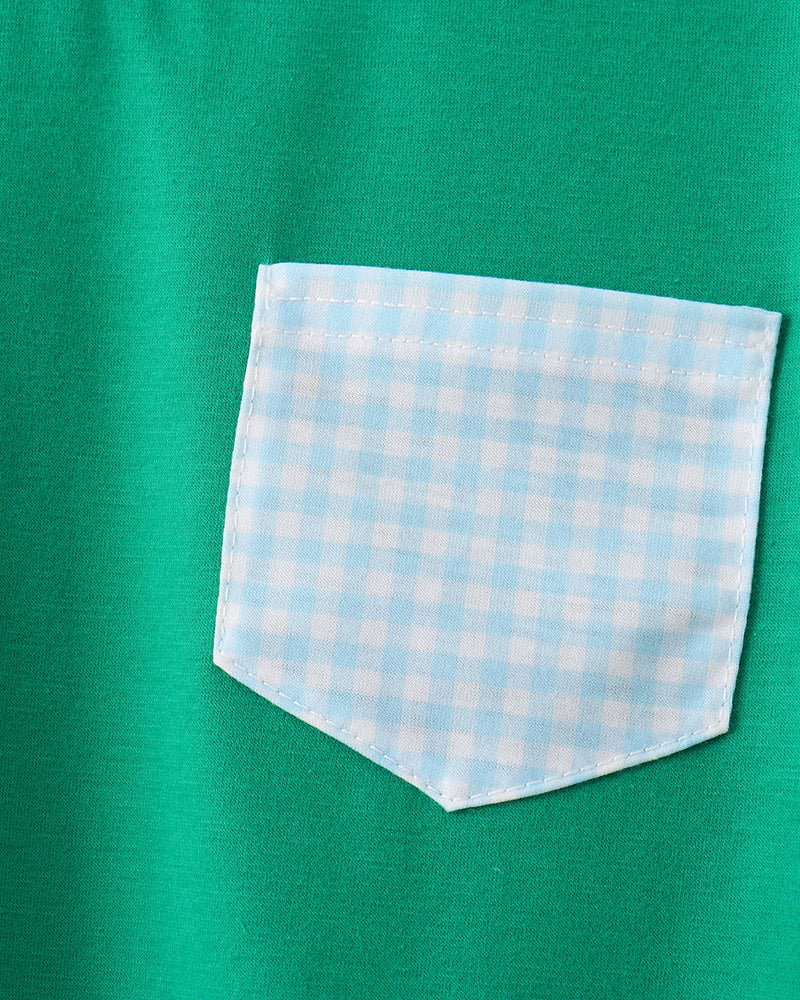 Green shirt with a light blue and white checkered pocket