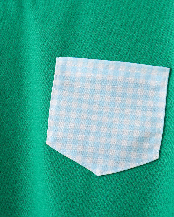 Green shirt with a light blue and white checkered pocket