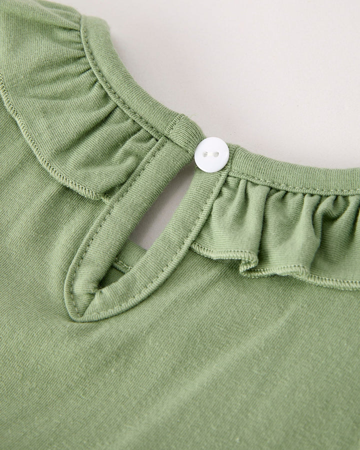 Green dress neckline with small button placket and ruffled gathered collar.