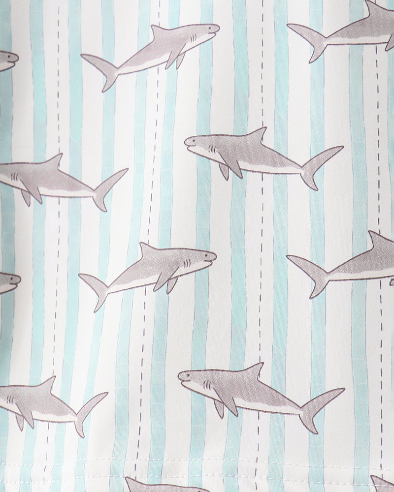 Fabric with shark pattern on a striped background