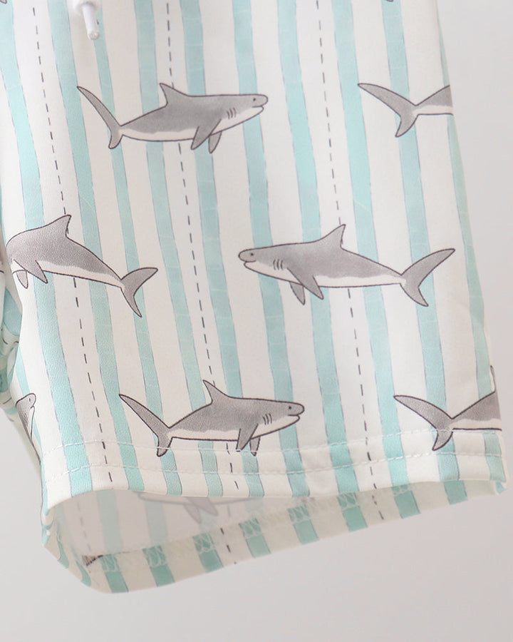 Fabric with shark pattern on striped background