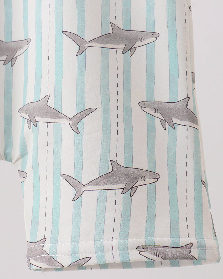 Fabric with shark pattern on a striped background