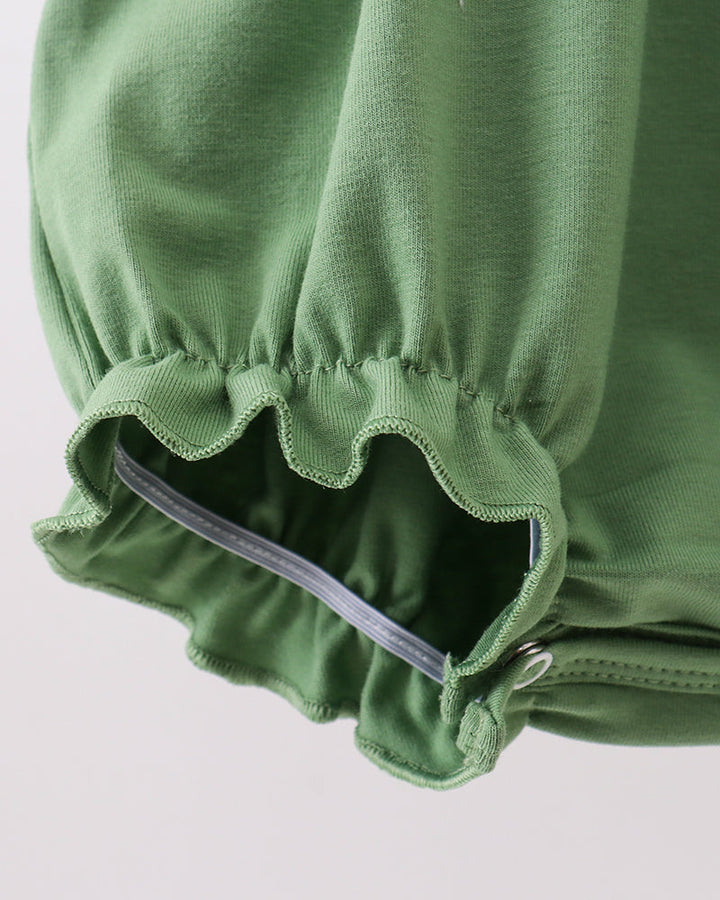 Green bubble romper with ruffled leg openings and elasticized fabric waist