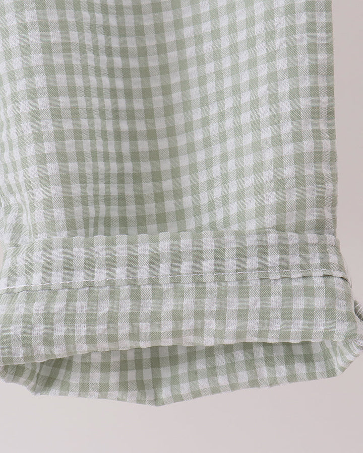 Green gingham pant hem with banded cuff and stitched edge