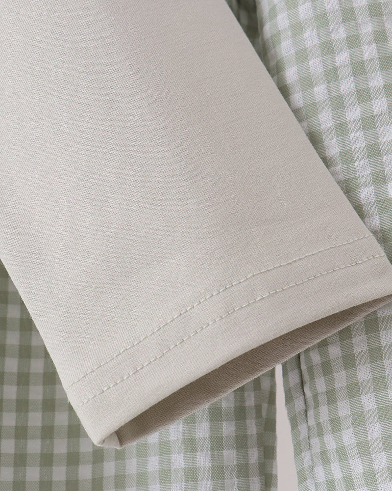 White long-sleeve shirt cuff with neat stitched hem