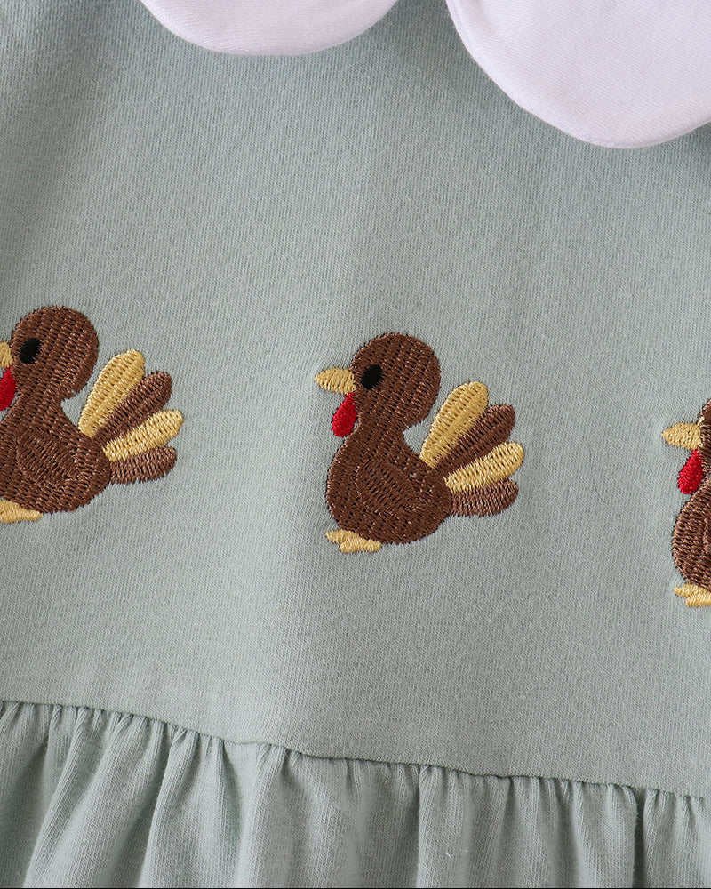 Sage green dress with three turkey appliques and gathered skirt panel