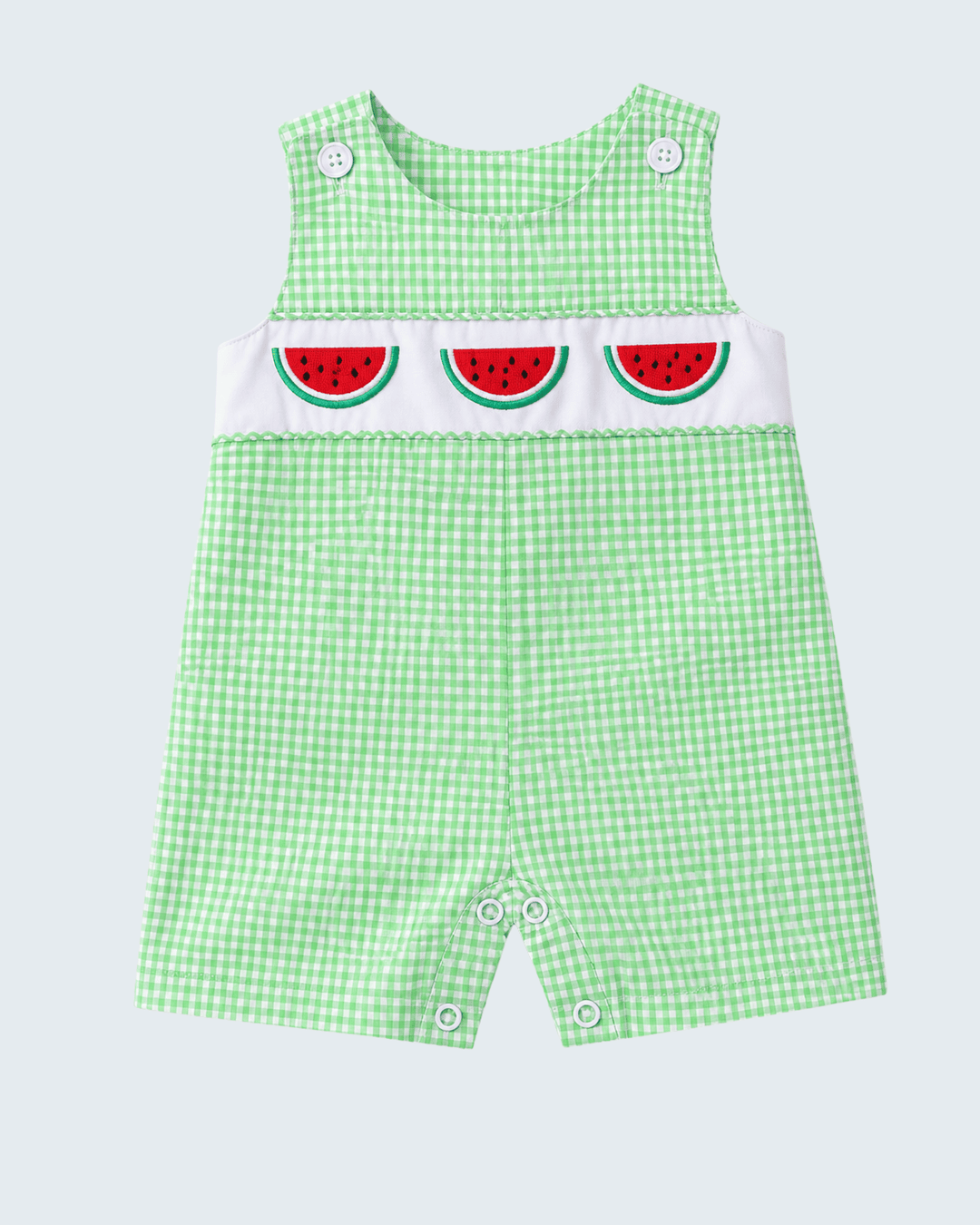 Green checkered romper with watermelon design on a light gray background