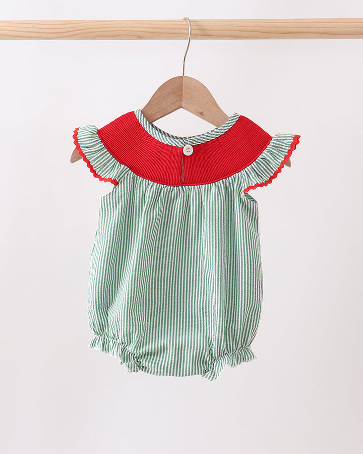 Green striped baby romper with red collar on a wooden hanger against a white background