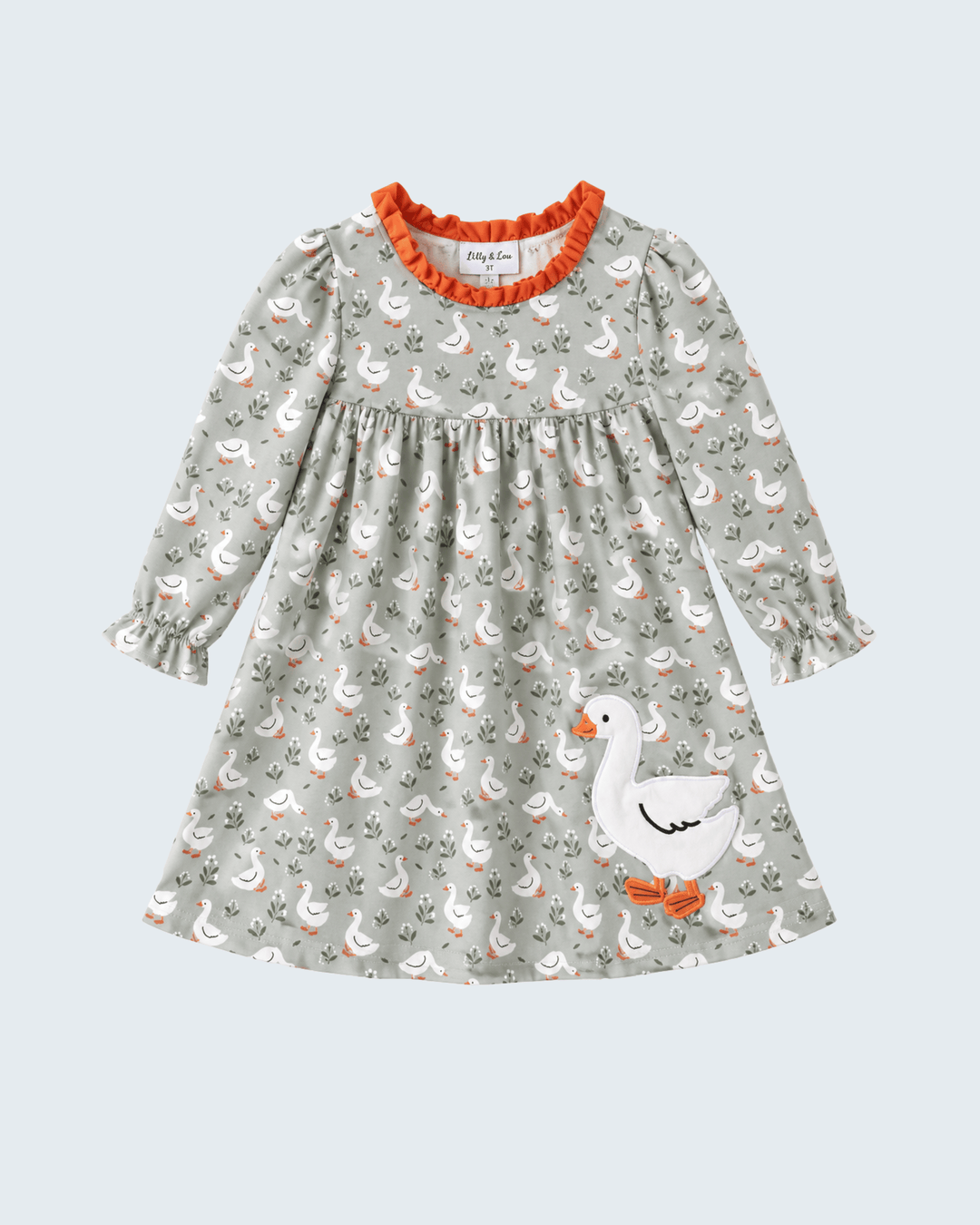 Light grey goose-print ruffle dress with orange trim and long puff sleeves