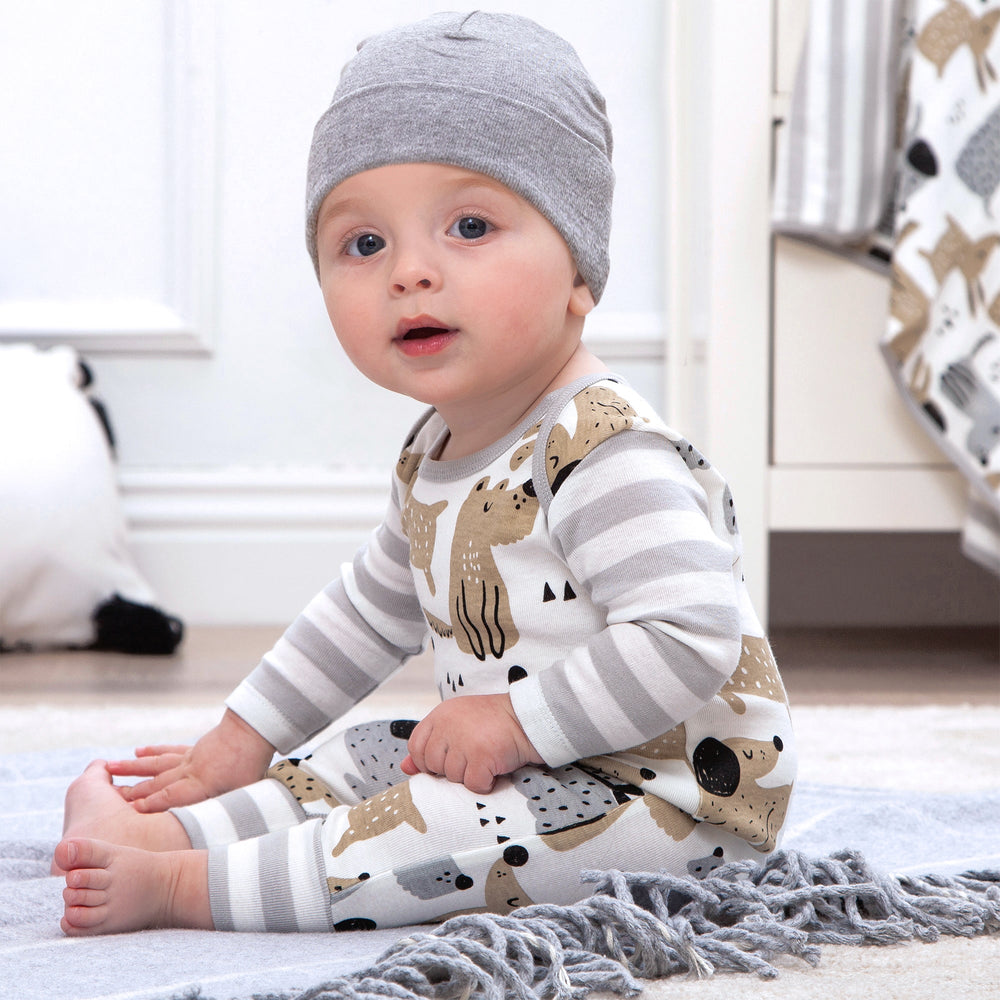Baby puppy dog romper with tan and black dog prints, gray striped sleeves and cuffs