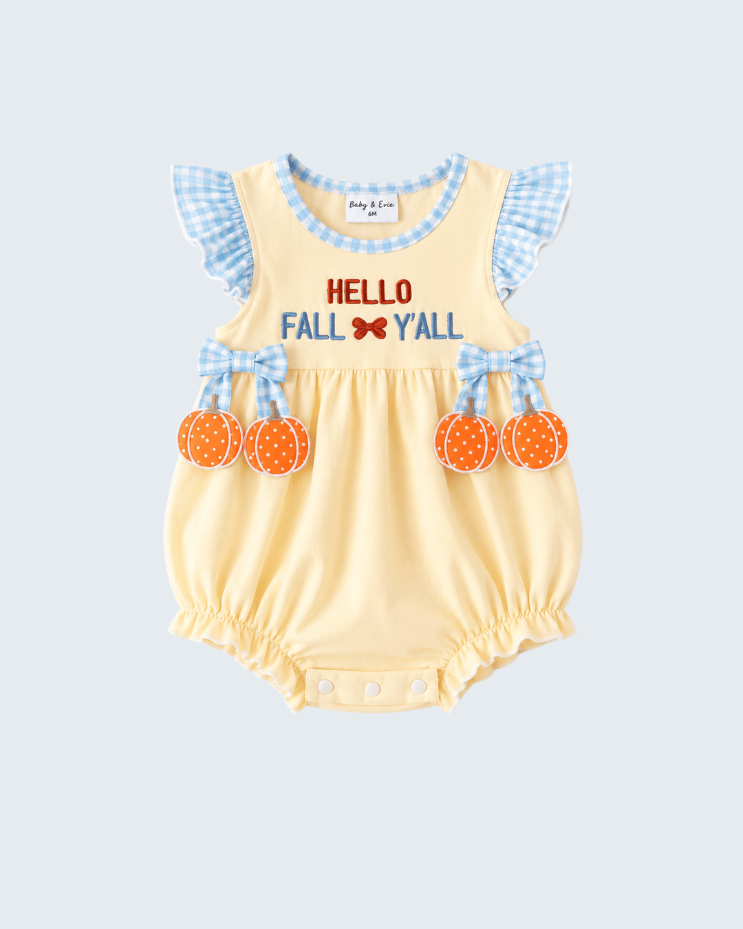 A baby romper in pale yellow with light blue gingham ruffle sleeves, featuring &