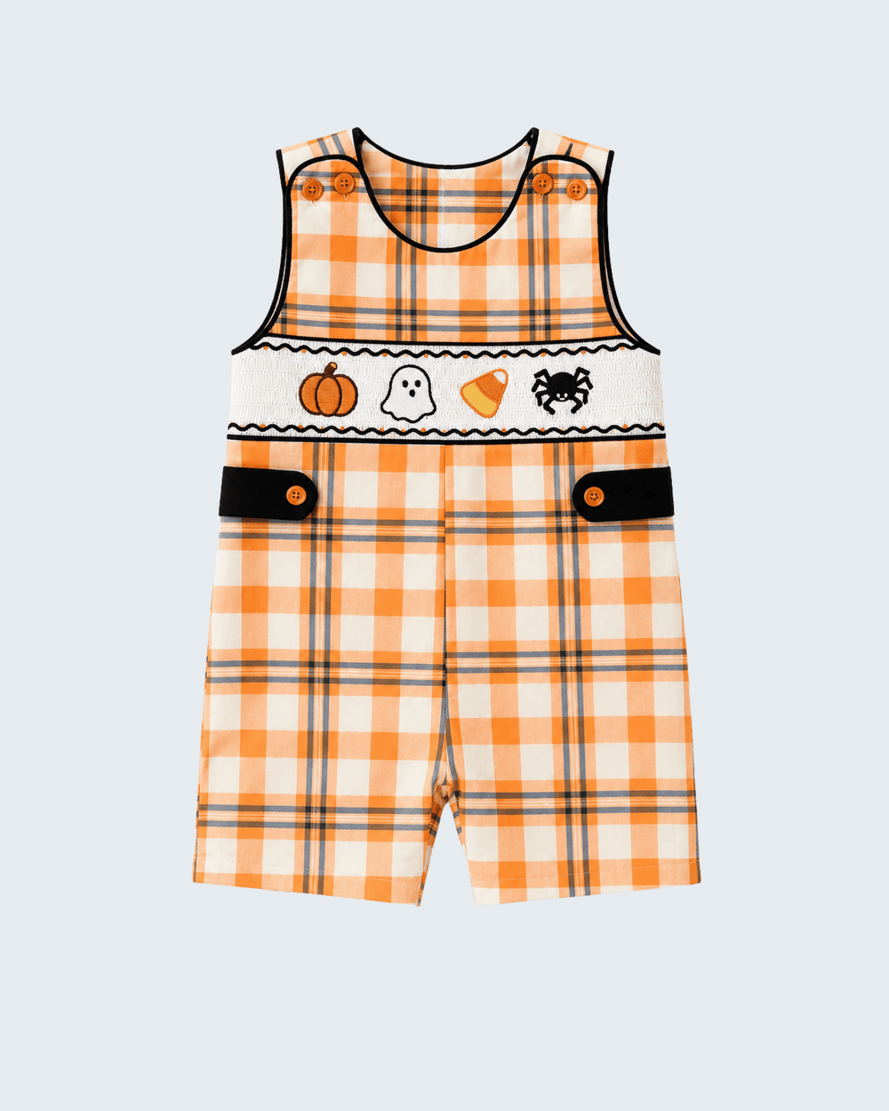 Orange plaid sleeveless jon jon romper with black trim and Halloween appliques