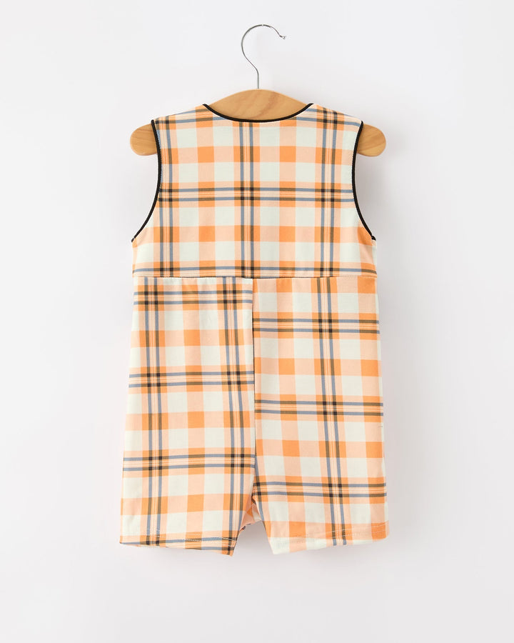Orange plaid boys JonJon romper with black-trimmed neckline and back yoke