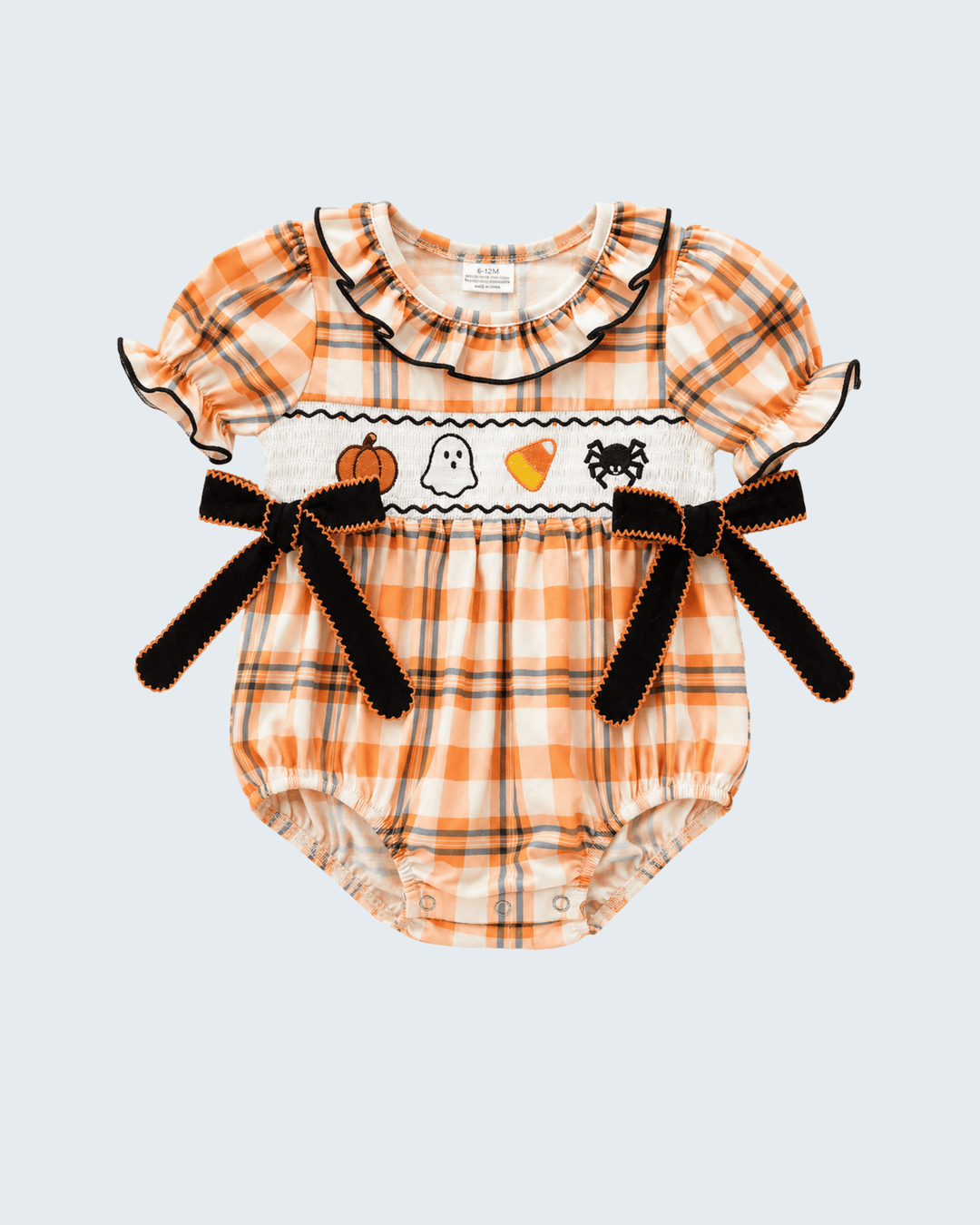 Orange plaid smocked bubble romper with black ruffle collar and Halloween ghost graphic