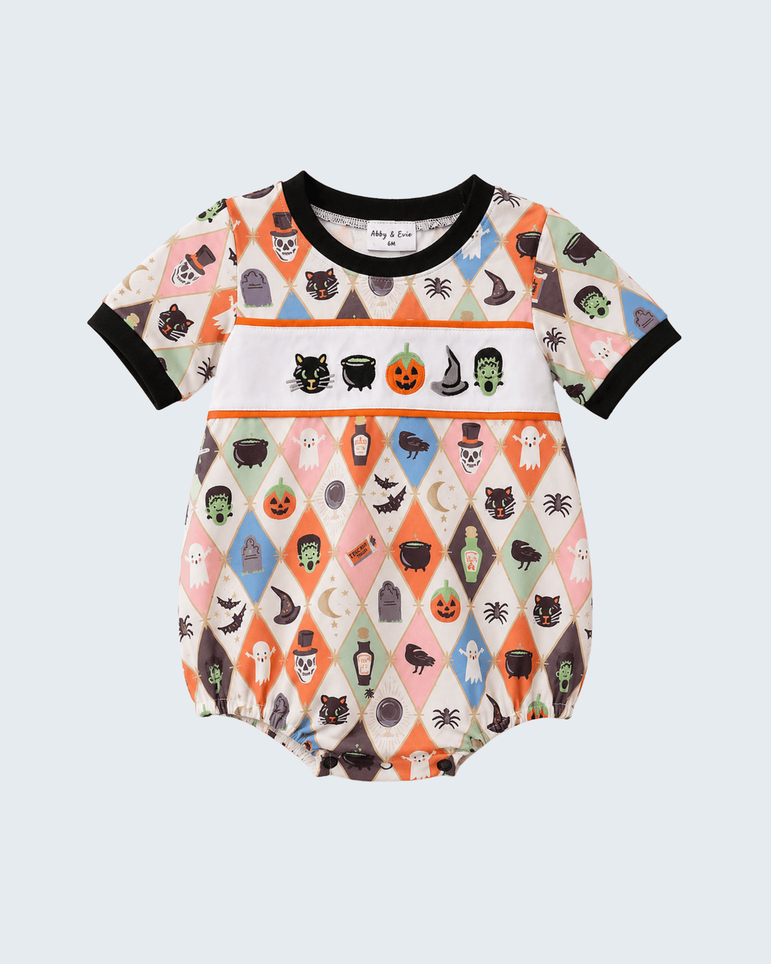 A baby short-sleeve romper with a Halloween-themed diamond pattern, featuring black trim on the collar and sleeve cuffs, set against a light gray background.
