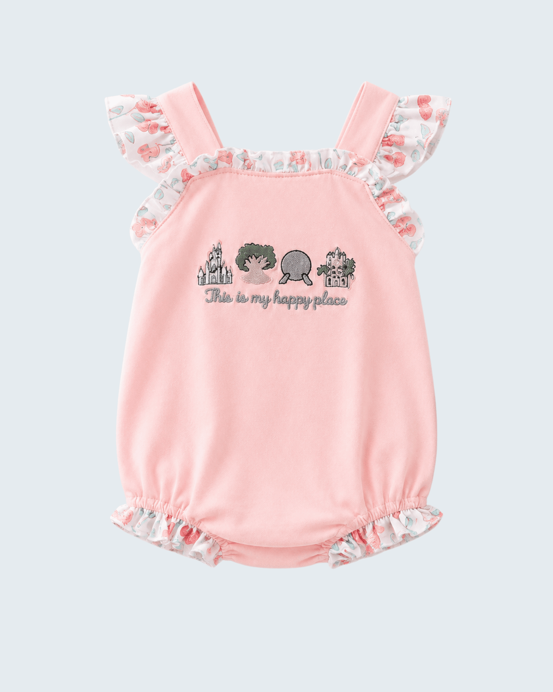 Pink baby romper with ruffled straps and text on a light gray background