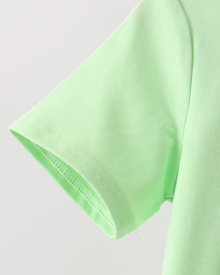 Lime green T-shirt sleeve with stitched trim detail