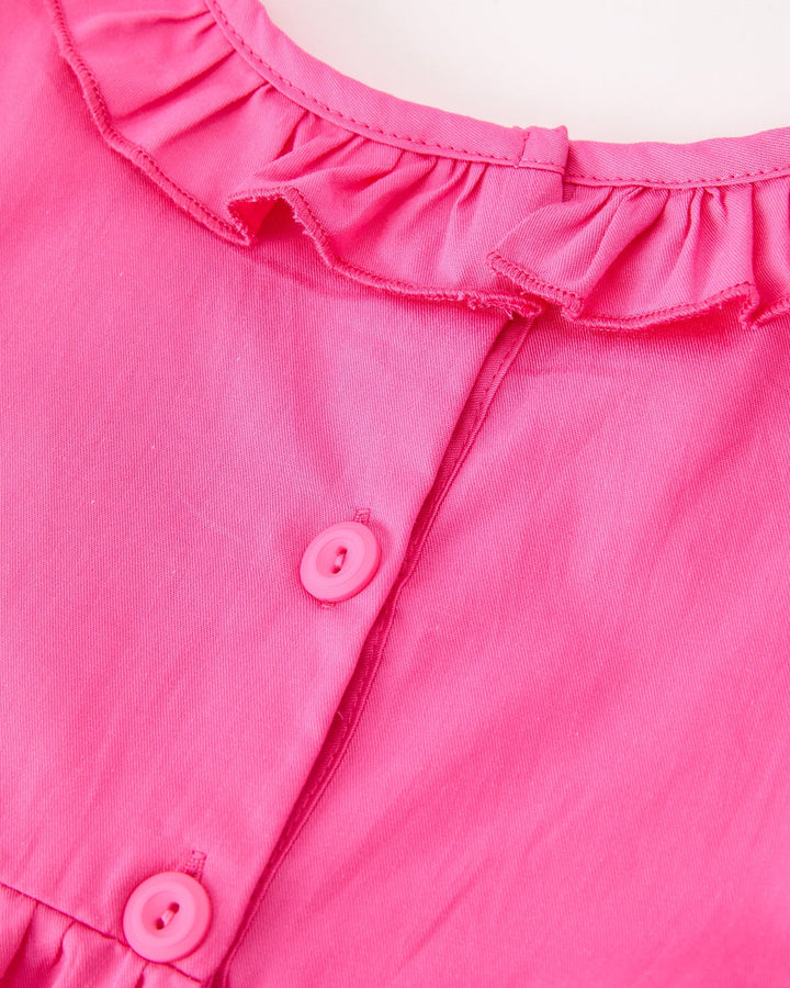Girls hot pink dress with ruffled neckline and two-button front closure