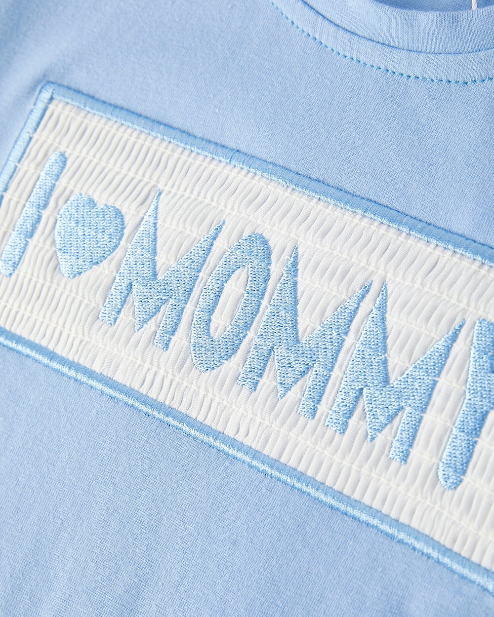 Light blue fabric with 'I ❤️ MOMMY' embroidery