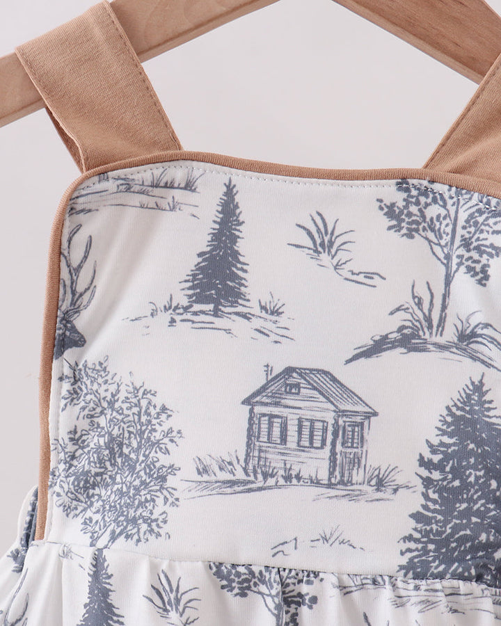 Sleeveless bubble romper bodice with blue woodland print and tan straps