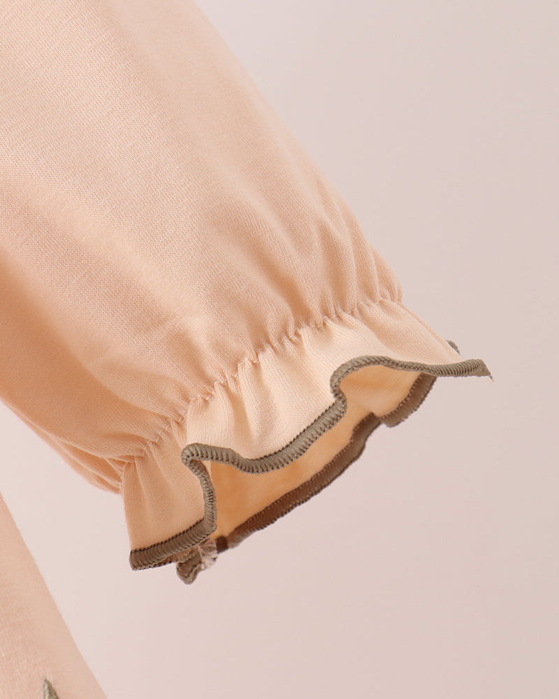 Beige long puff sleeve with elastic cuff and stitched trim