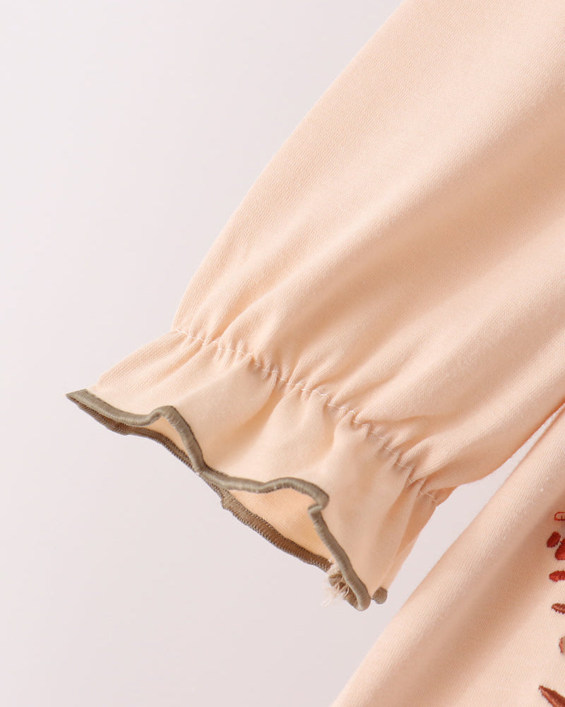 Beige puff sleeve with ruffled hem and gathered cuffs