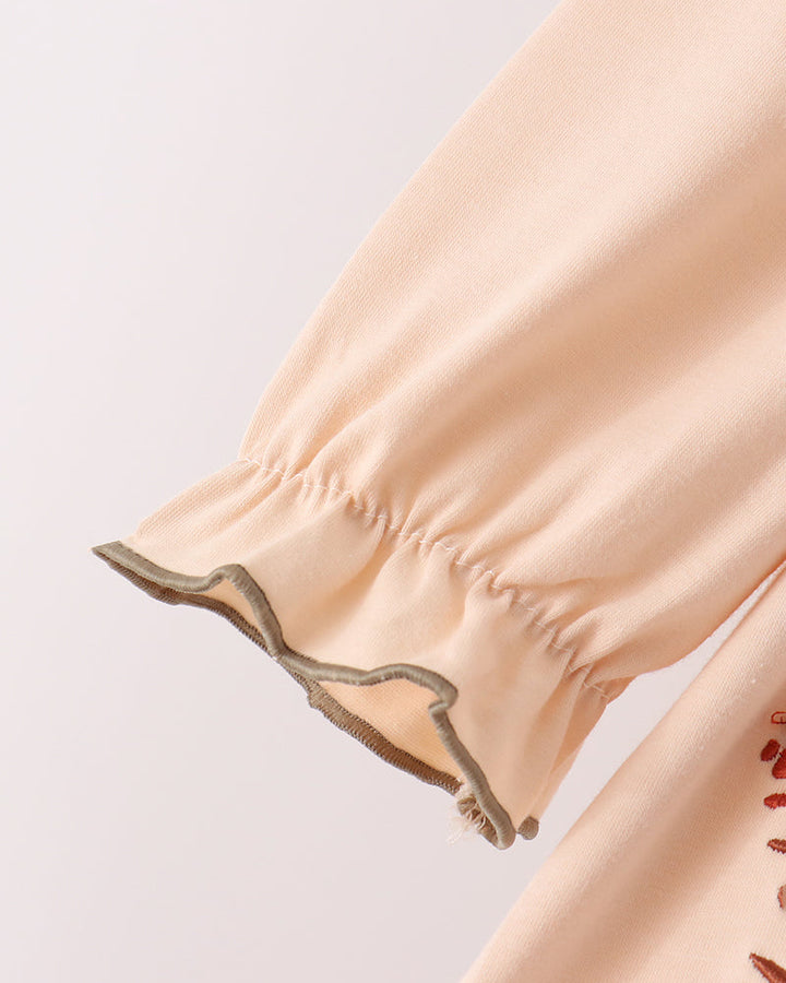 Beige puff sleeve with ruffled hem and gathered cuffs
