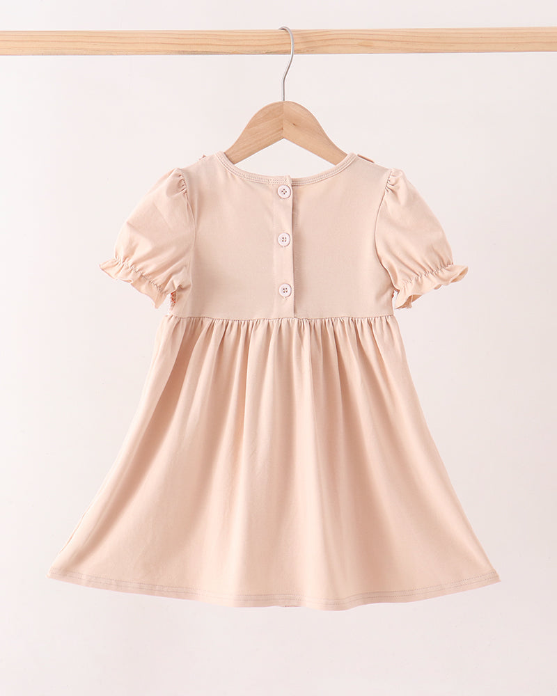 A light peach-pink toddler girl&