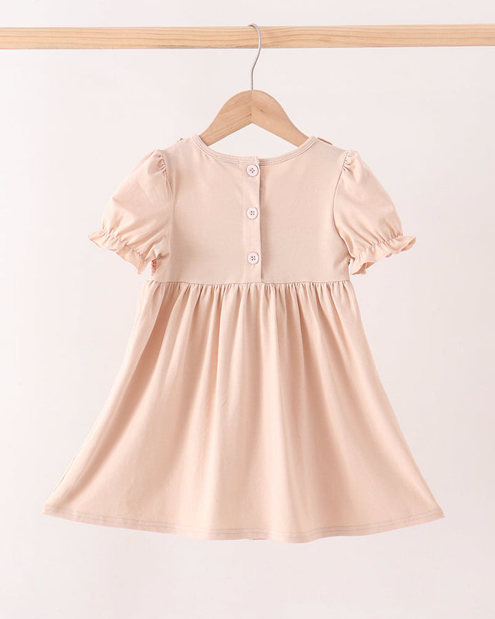 A light peach-pink toddler girl&