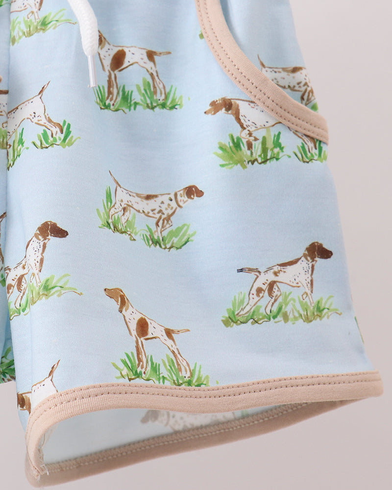 Light blue fabric with dog pattern on a beige background