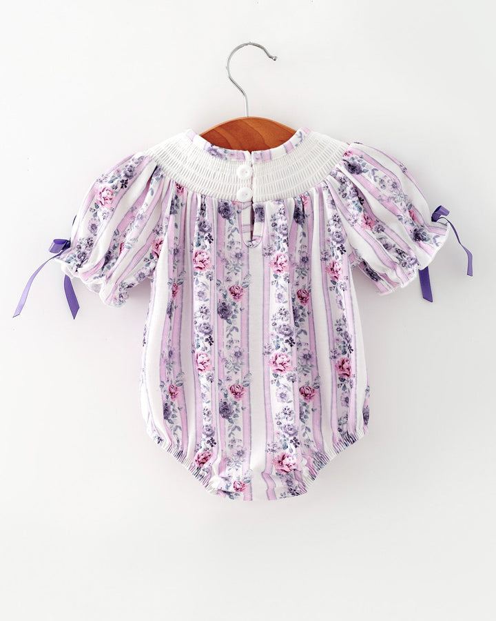 Baby girl romper with smocked round neck, lavender rose striped print, short sleeves, ribbon bows
