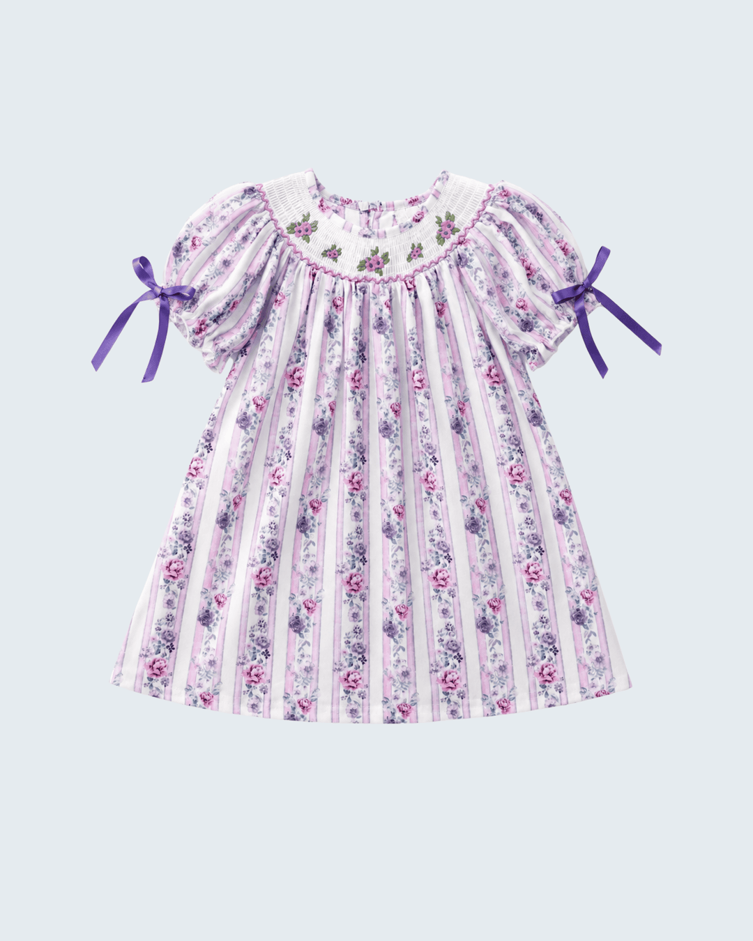 Lavender floral smocked dress with striped print, flutter sleeves and ribbon bows