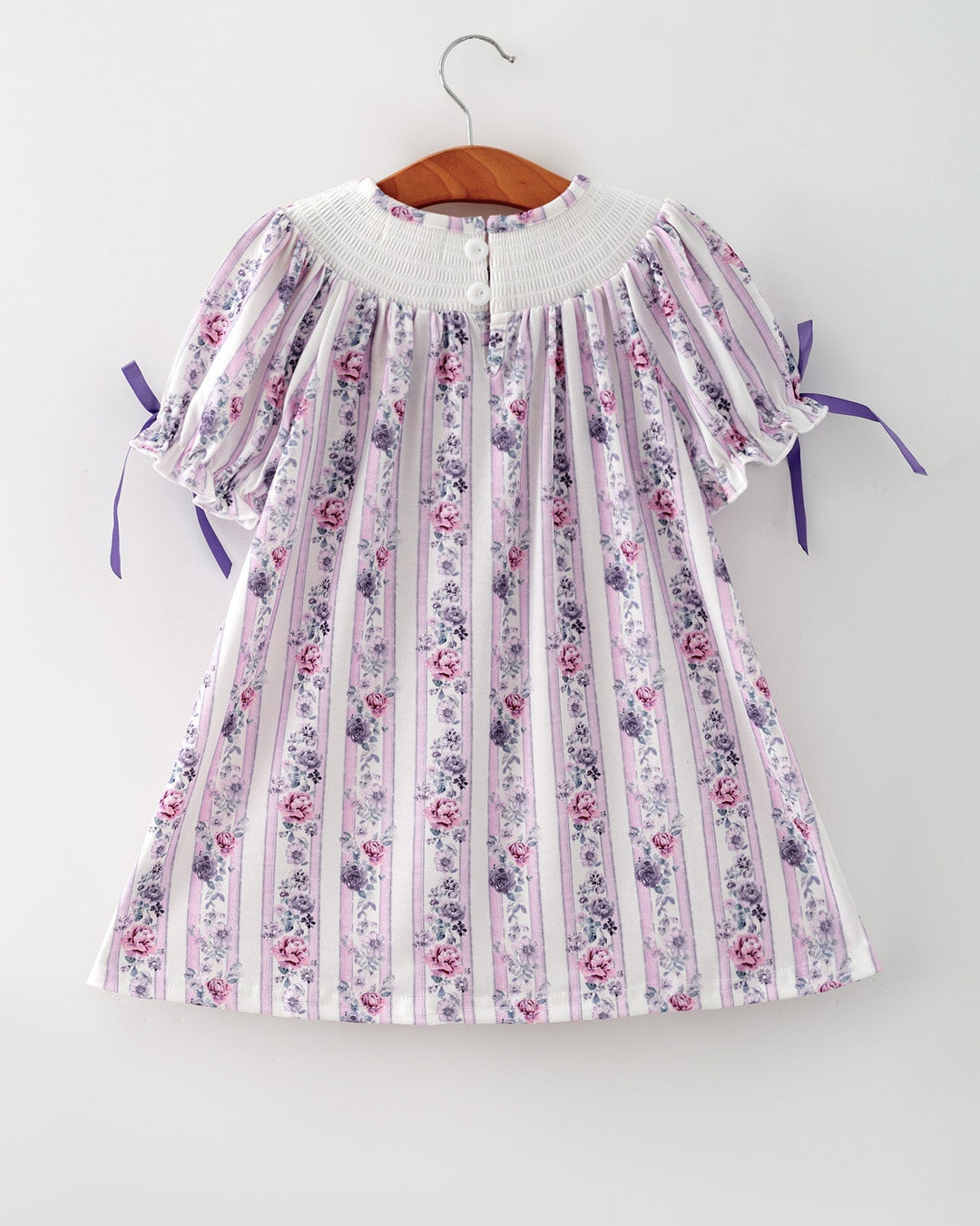 Girls floral striped dress with ruched smocked neckline and lavender ribbon details