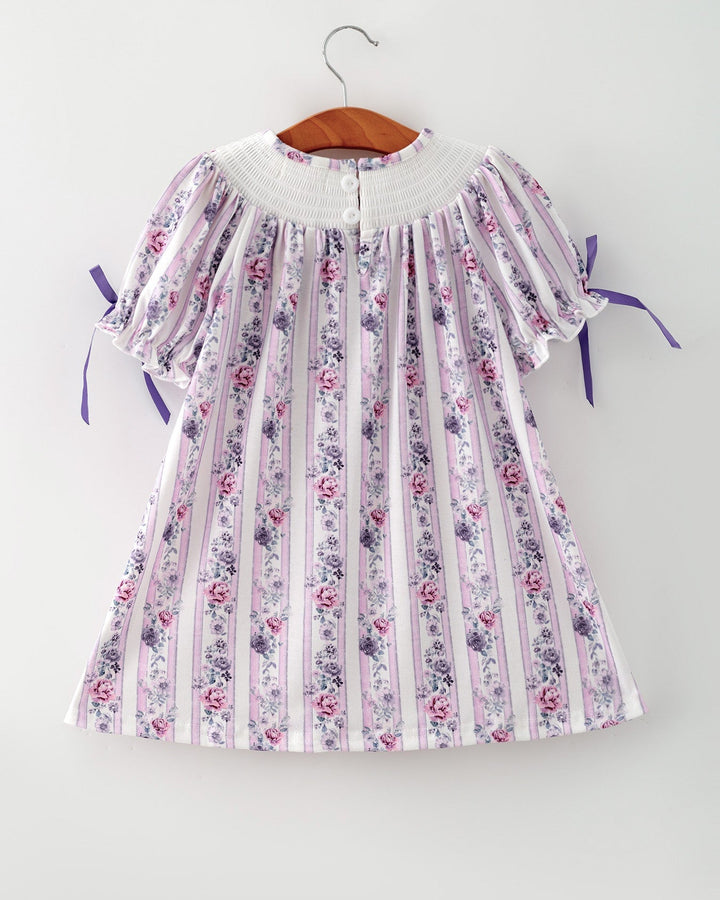 Girls floral striped dress with ruched smocked neckline and lavender ribbon details