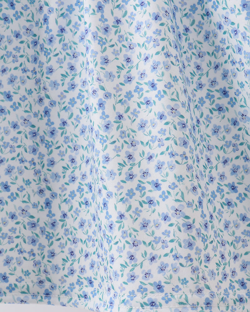 Light blue floral gathered skirt with smocked waist and flowing hem