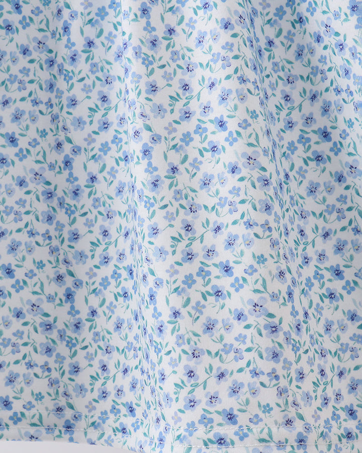 Light blue floral gathered skirt with smocked waist and flowing hem