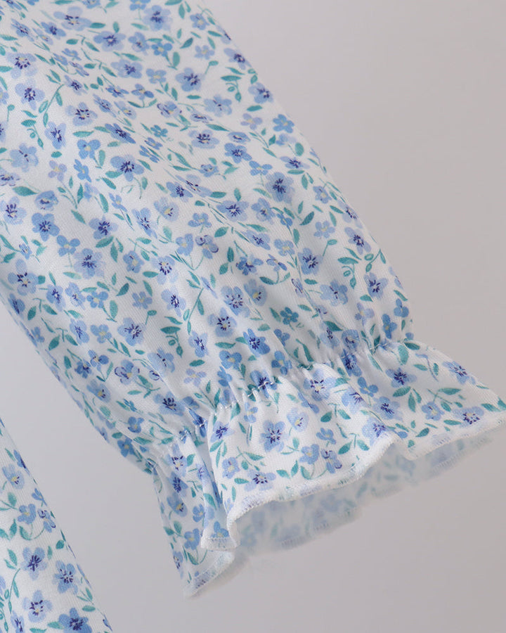 Long-sleeve floral dress with elastic cuffs and gathered hem, light blue