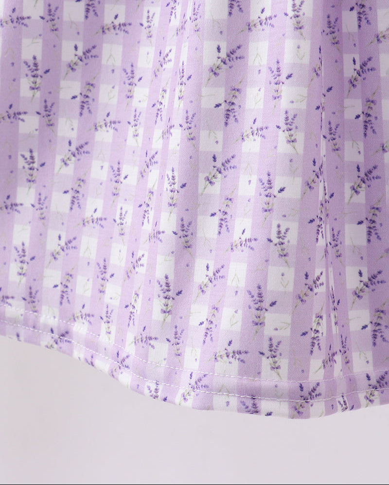 Lavender checkered fabric with floral pattern on a white background