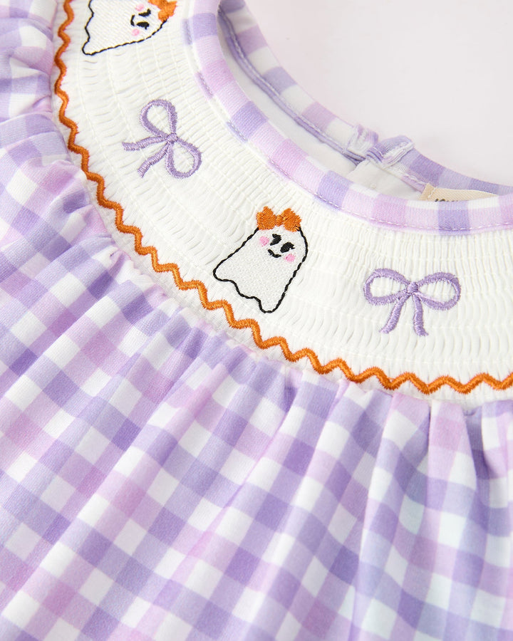 Plaid dress yoke with white ric-rac trim, ghost faces, and purple bow accents