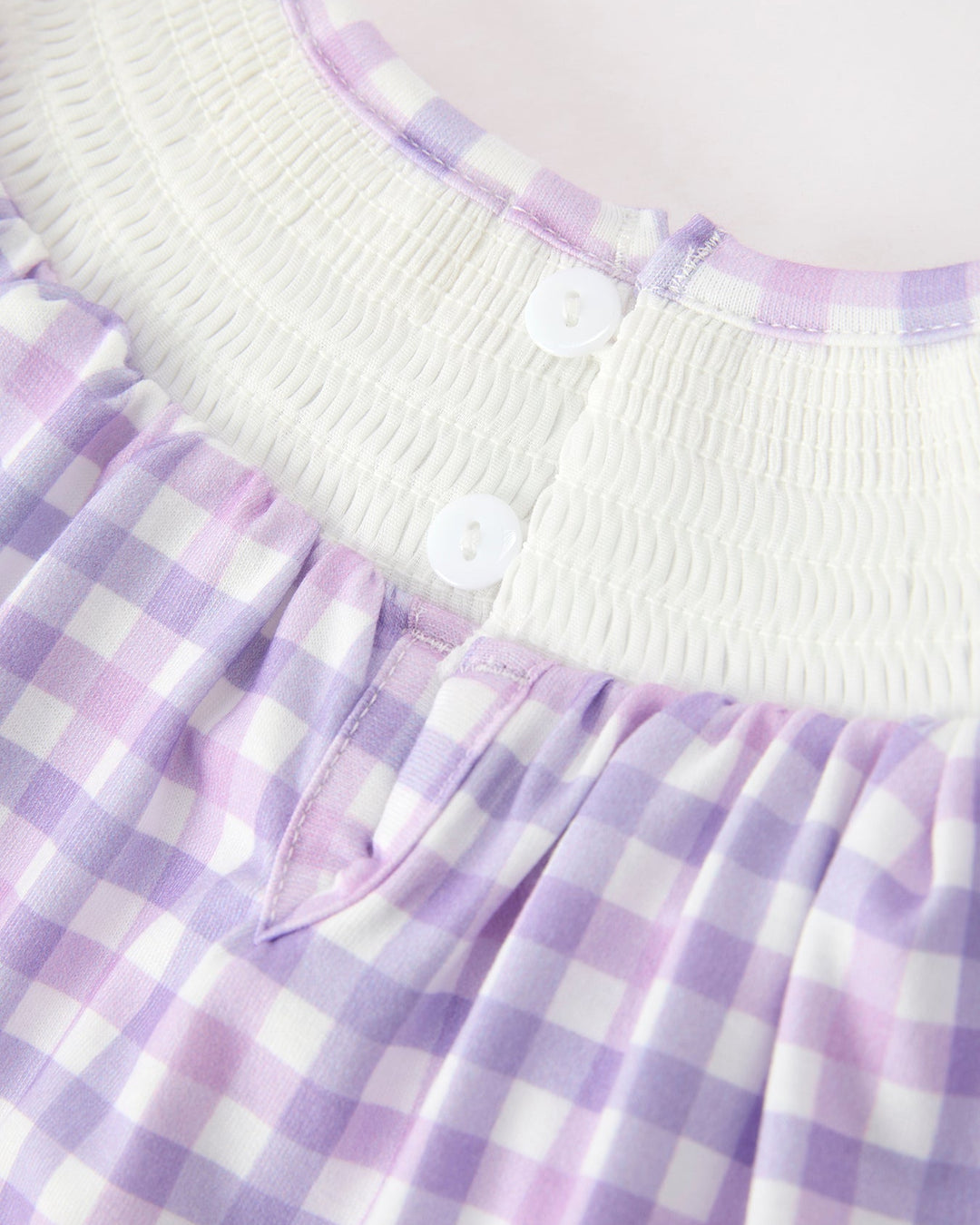 Lavender gingham dress with white button placket and scalloped ruffle at neckline