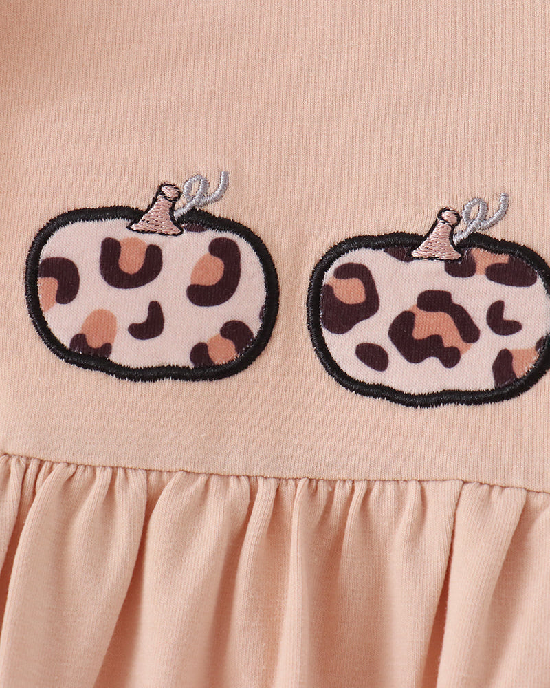 Beige dress bodice with two stitched leopard pumpkin applique designs