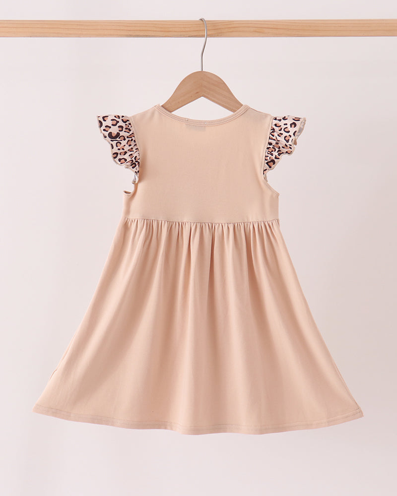 Beige sleeveless A-line dress with gathered skirt and leopard ruffle sleeves
