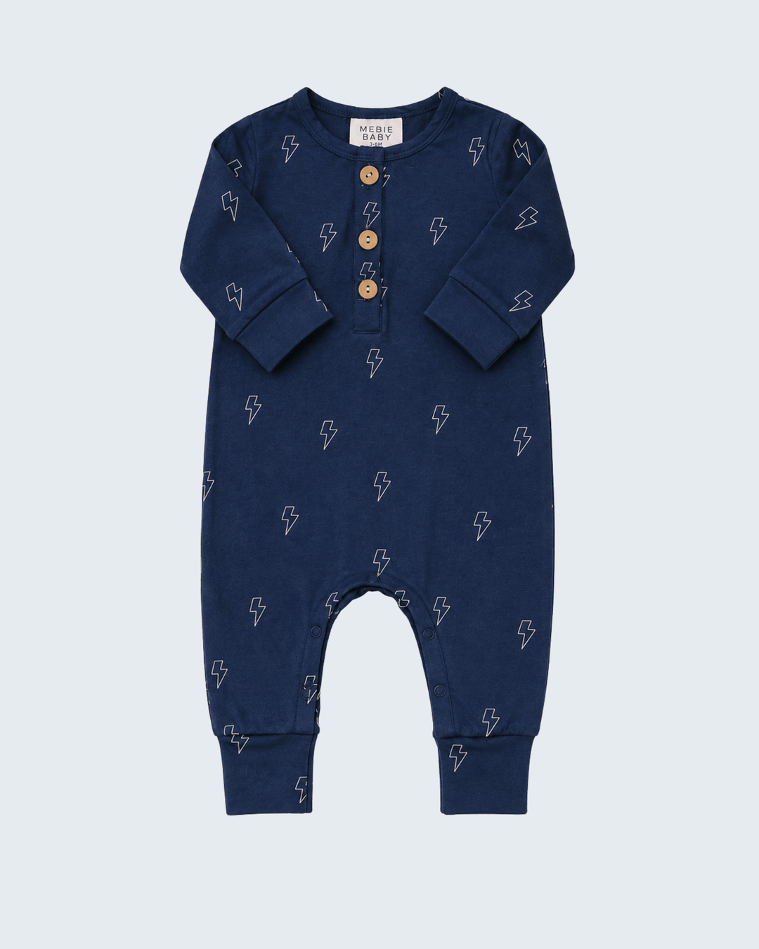 Navy lightning-print button romper with long sleeves and snap placket